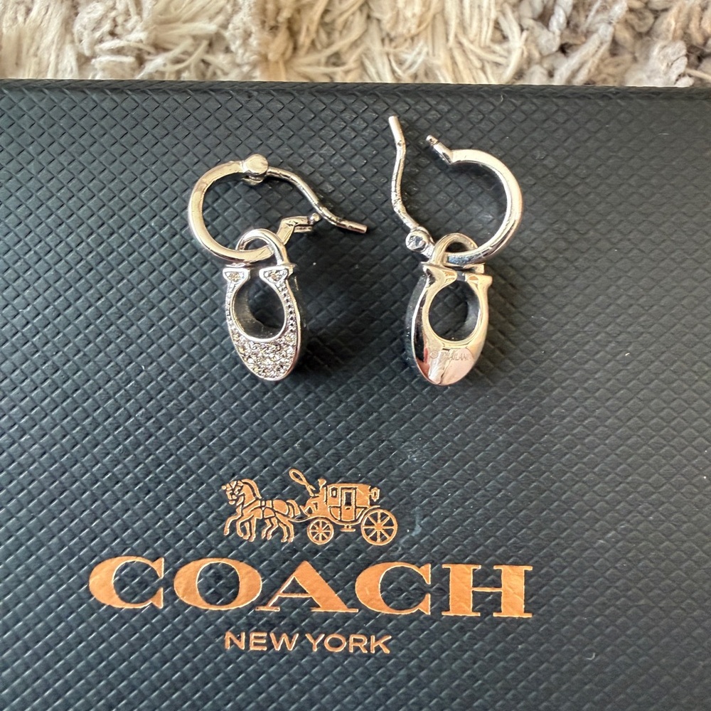 Coach Silver-Tone Crystal Horsebit Drop Hoop Earrings